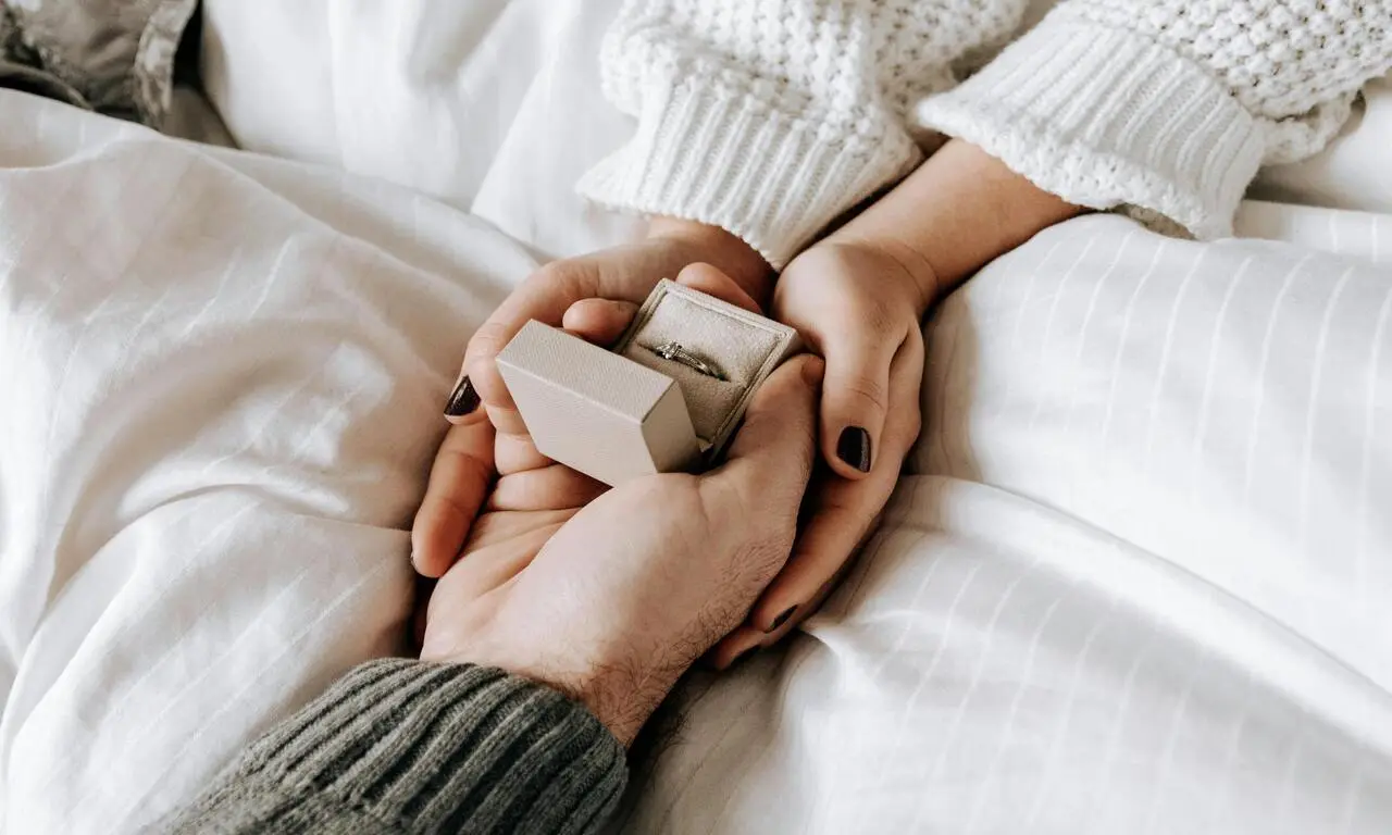 Romantic young couple sharing gifts